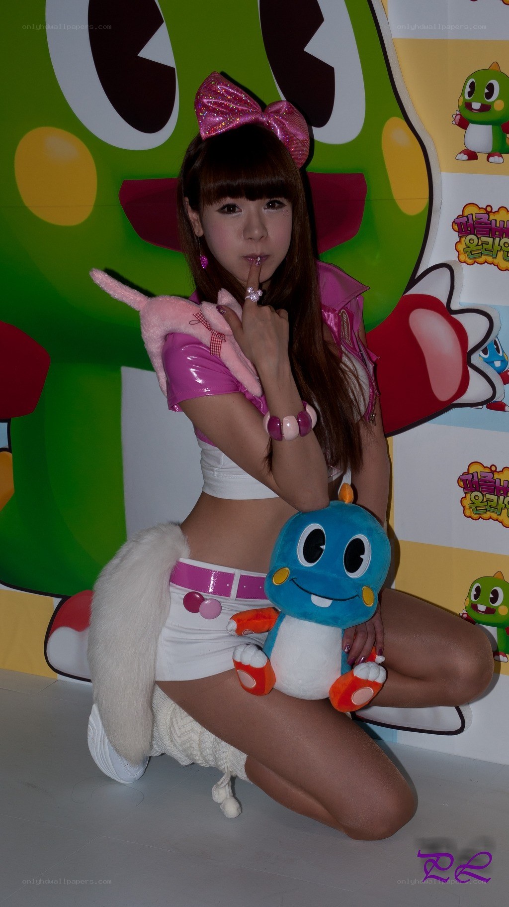 cosplayer with plush toys