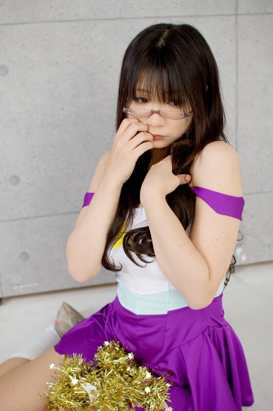 cosplayer with pom-poms
