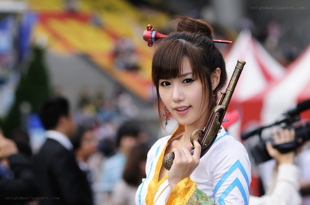 cosplayer with prop gun