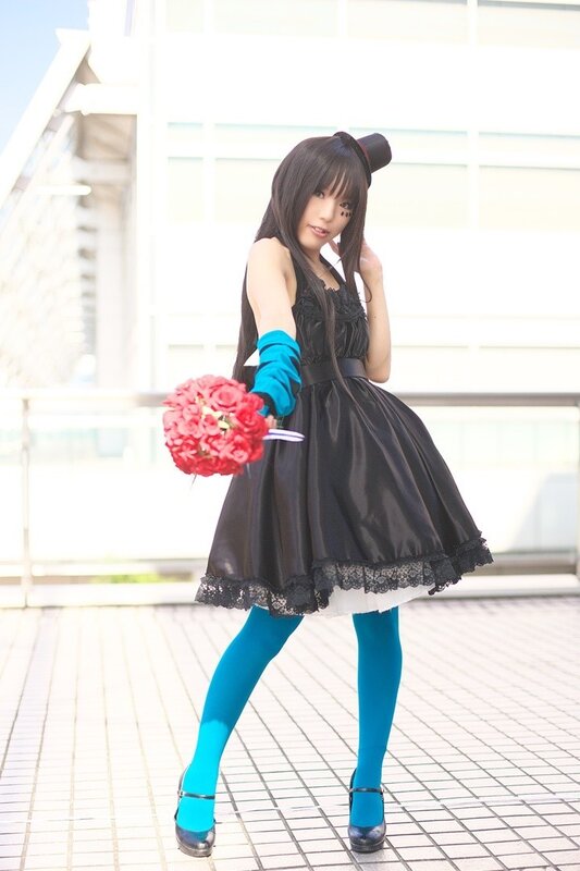 cosplayer with red bouquet