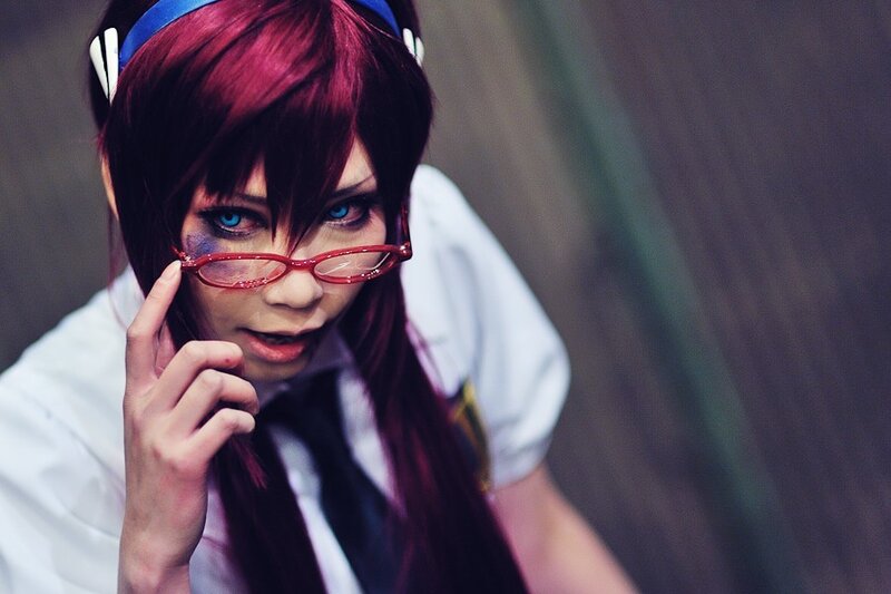 cosplayer with red hair and glasses
