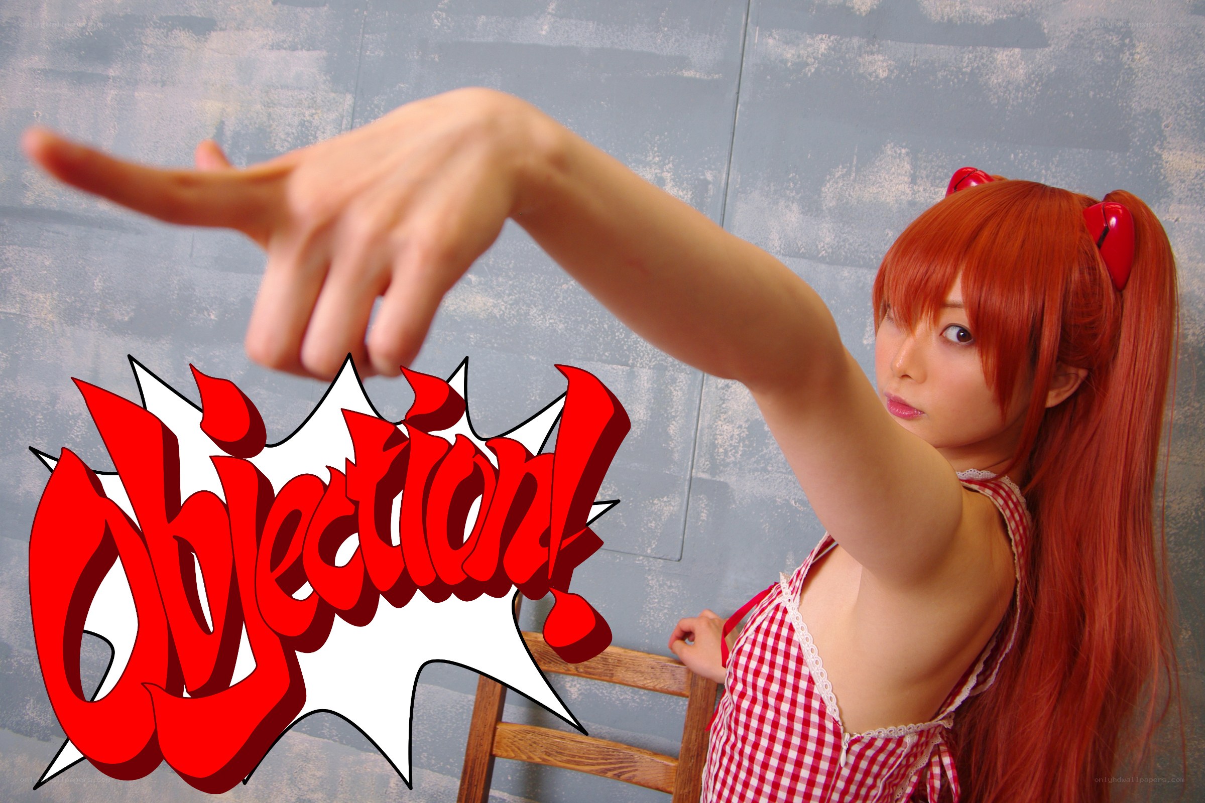 Cosplayer with red hair and 'Objection!' text