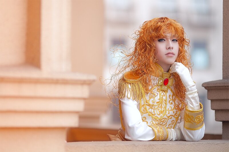 cosplayer with red hair in costume