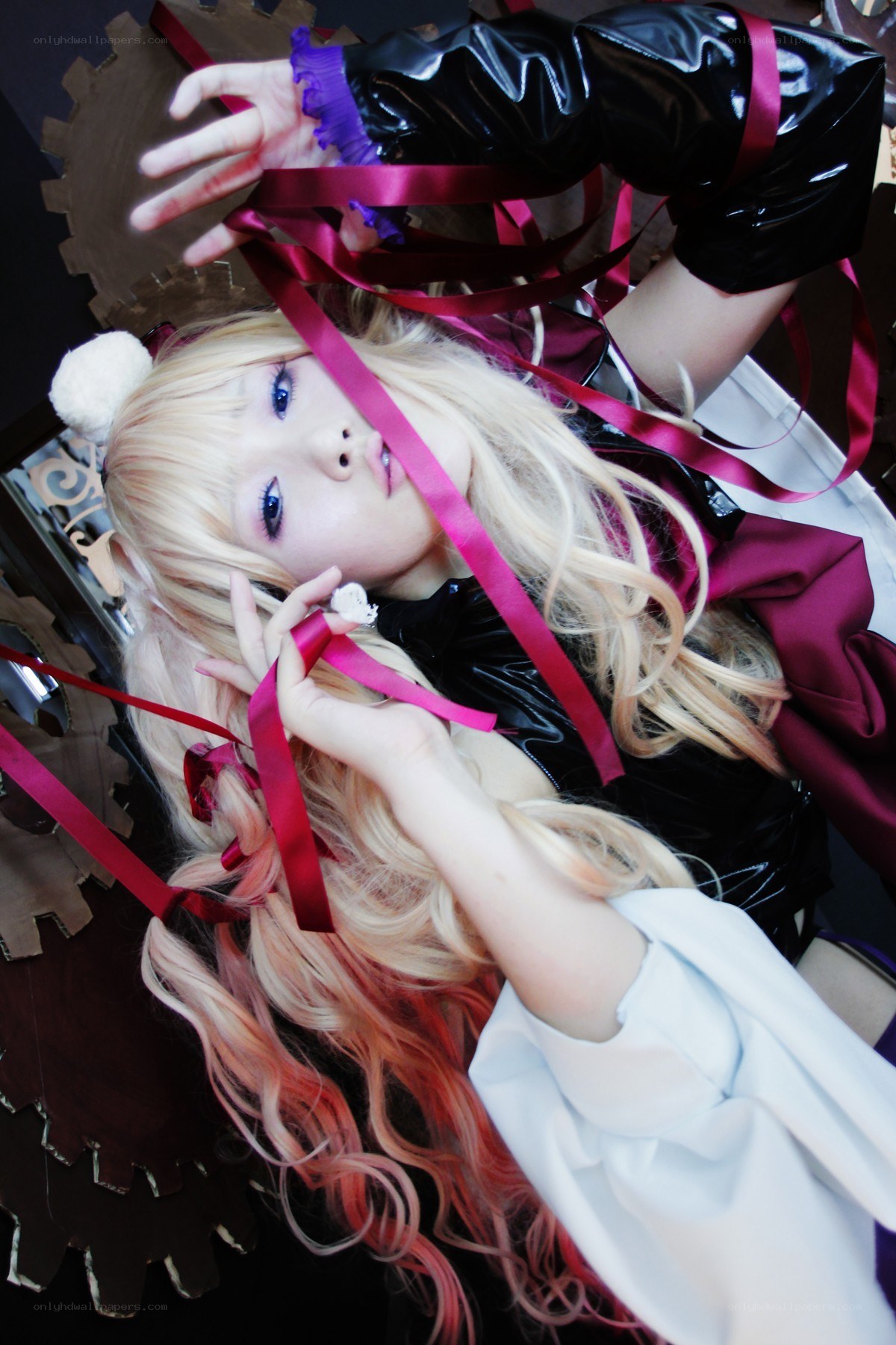cosplayer with ribbons and gears