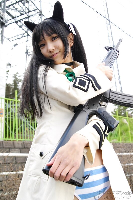 cosplayer with rifle and cat ears