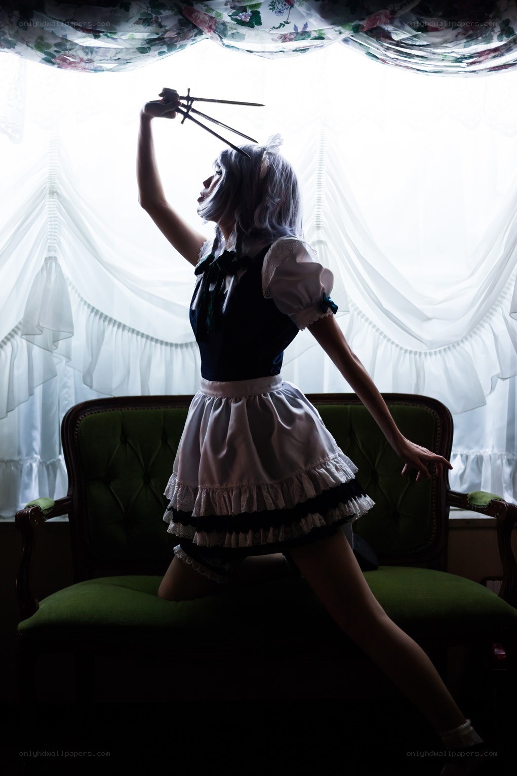 Cosplayer with scissors in silhouette