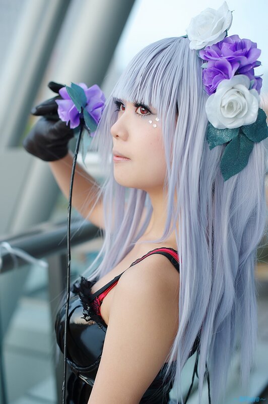 cosplayer with silver hair and flowers