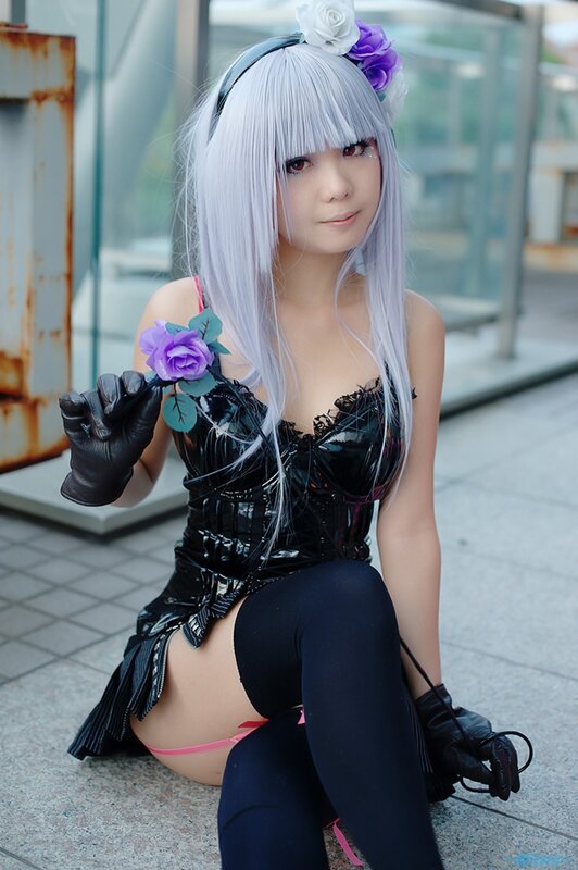 cosplayer with silver hair and flowers