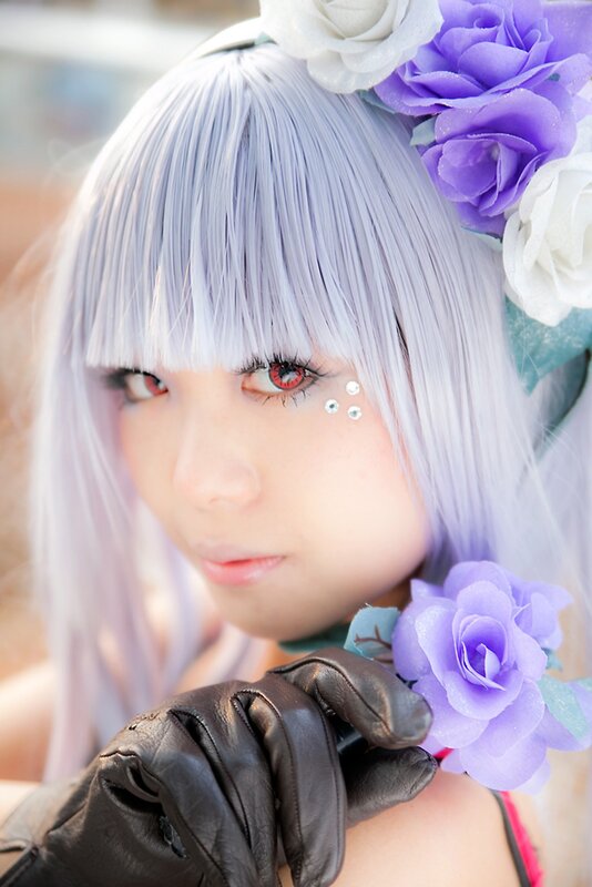 cosplayer with silver hair and flowers