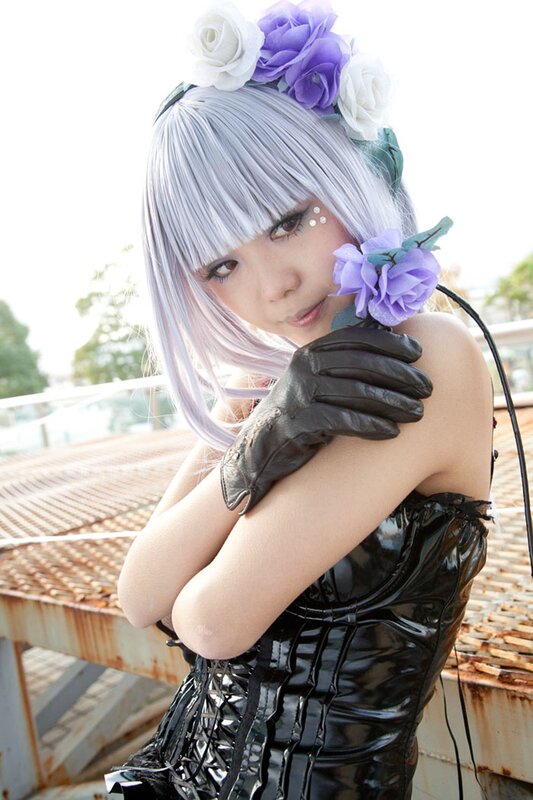 cosplayer with silver hair and flowers
