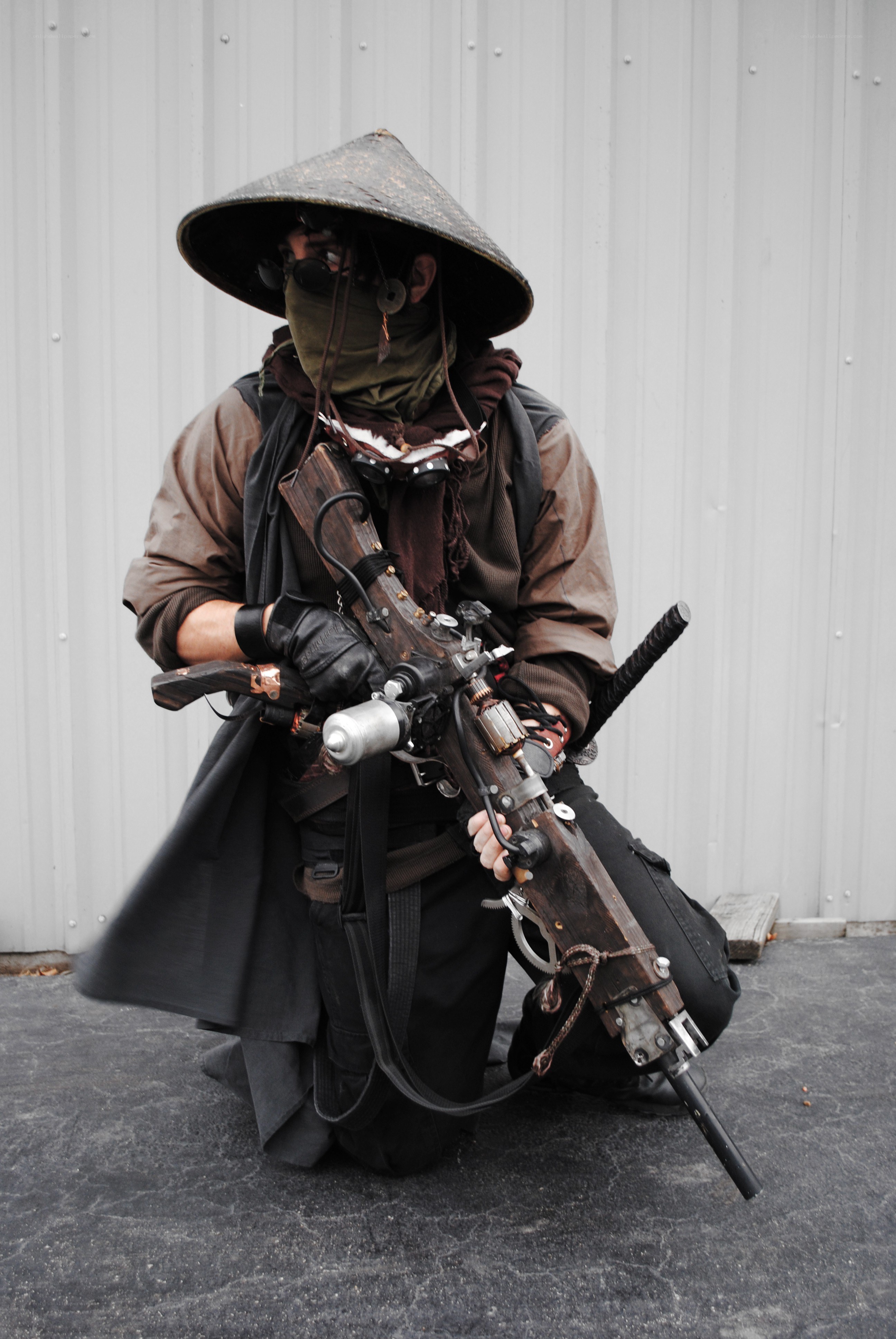 cosplayer with steampunk rifle