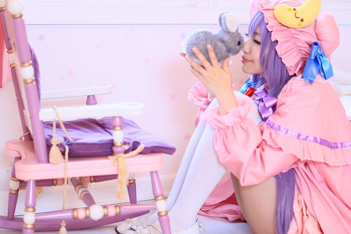 cosplayer with stuffed rabbit