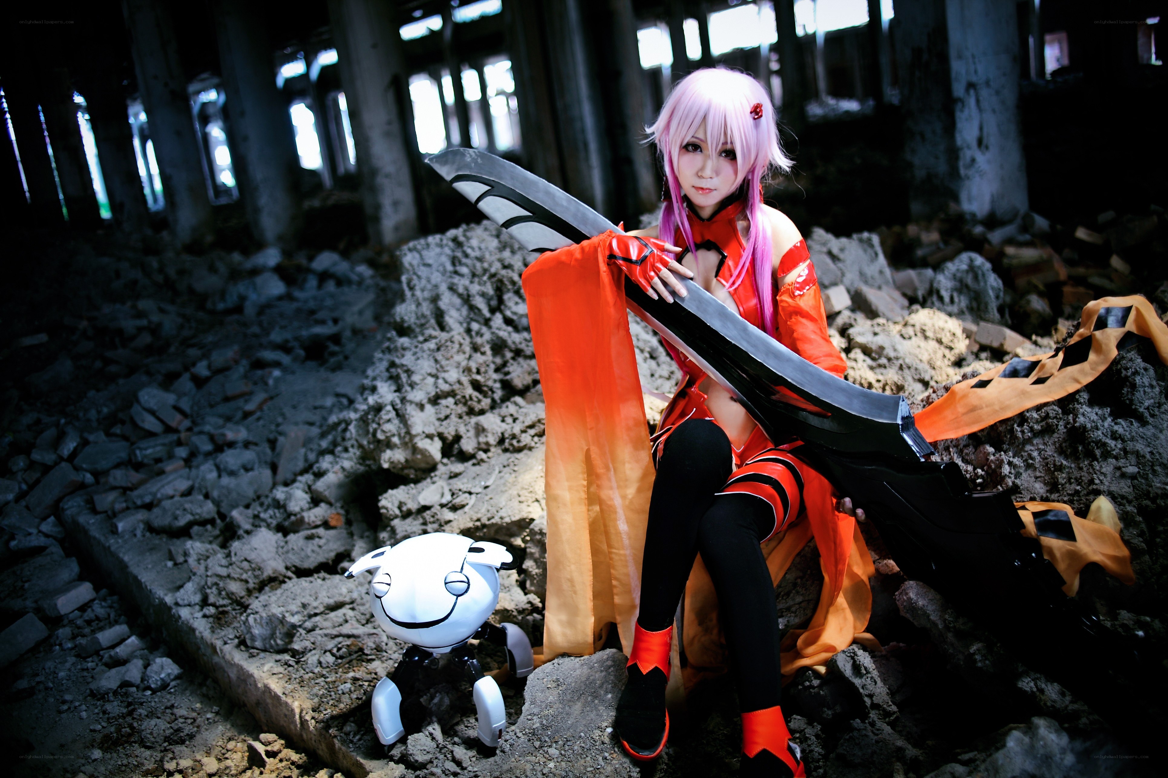 cosplayer with sword in ruins