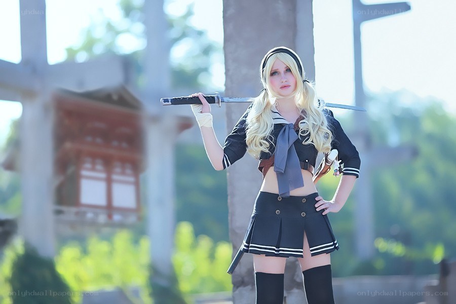 cosplayer with sword in school uniform