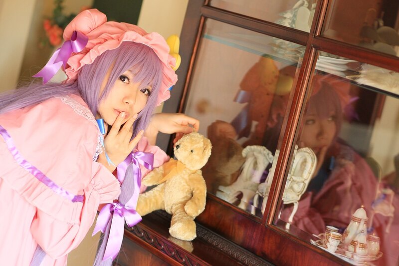 cosplayer with teddy bear