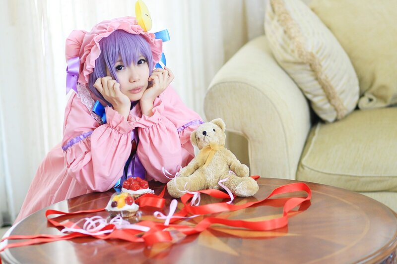 cosplayer with teddy bear