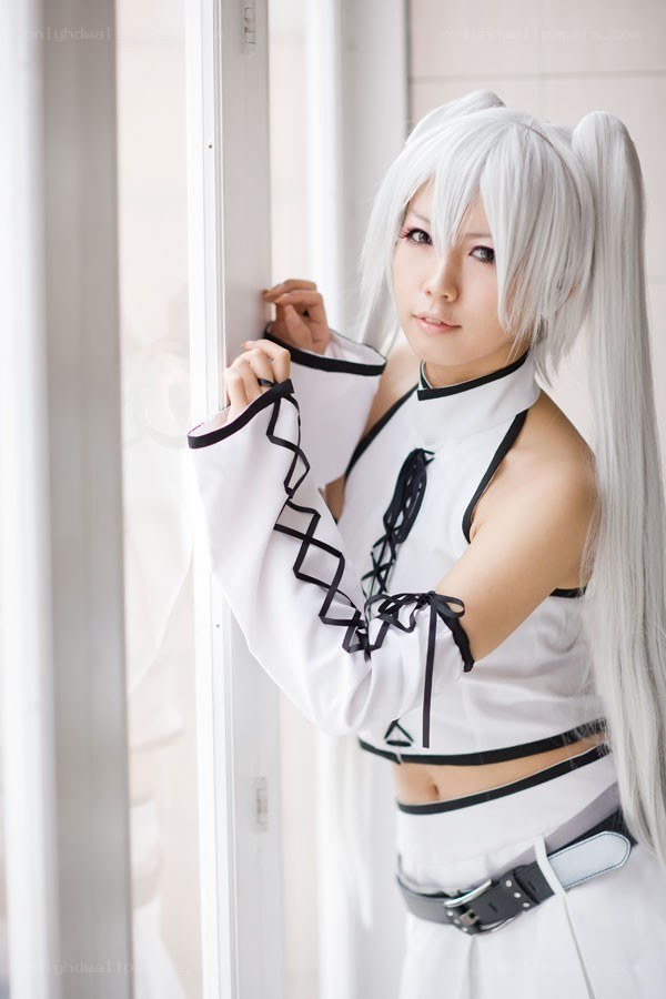 cosplayer with white hair by window