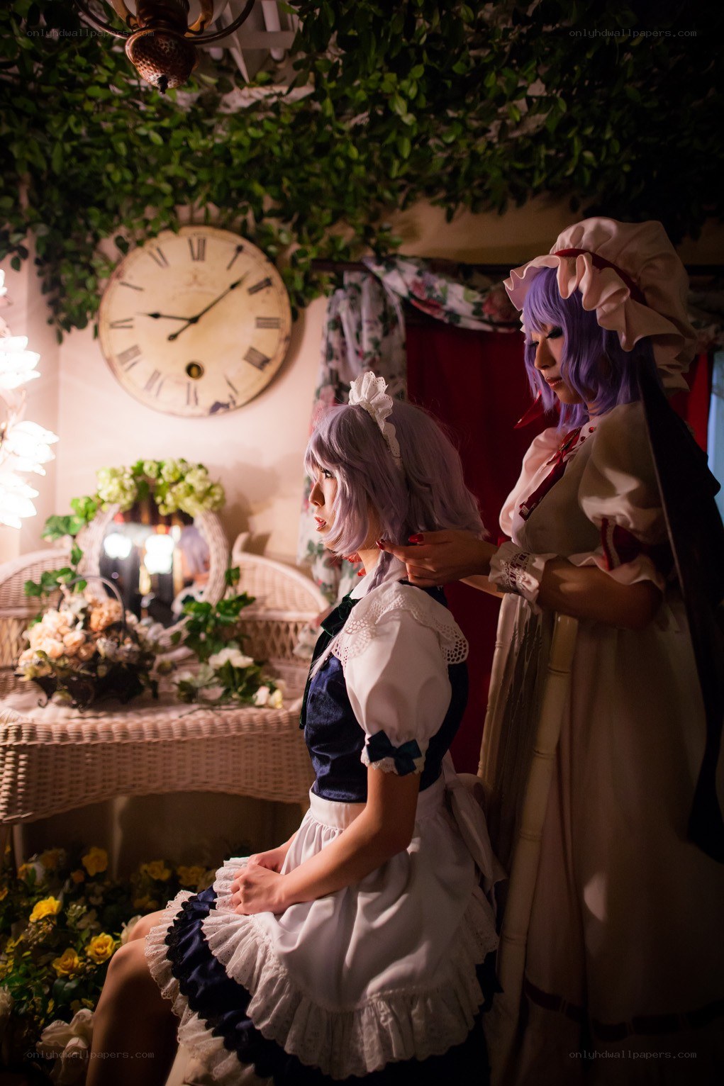 Cosplayers in a garden room
