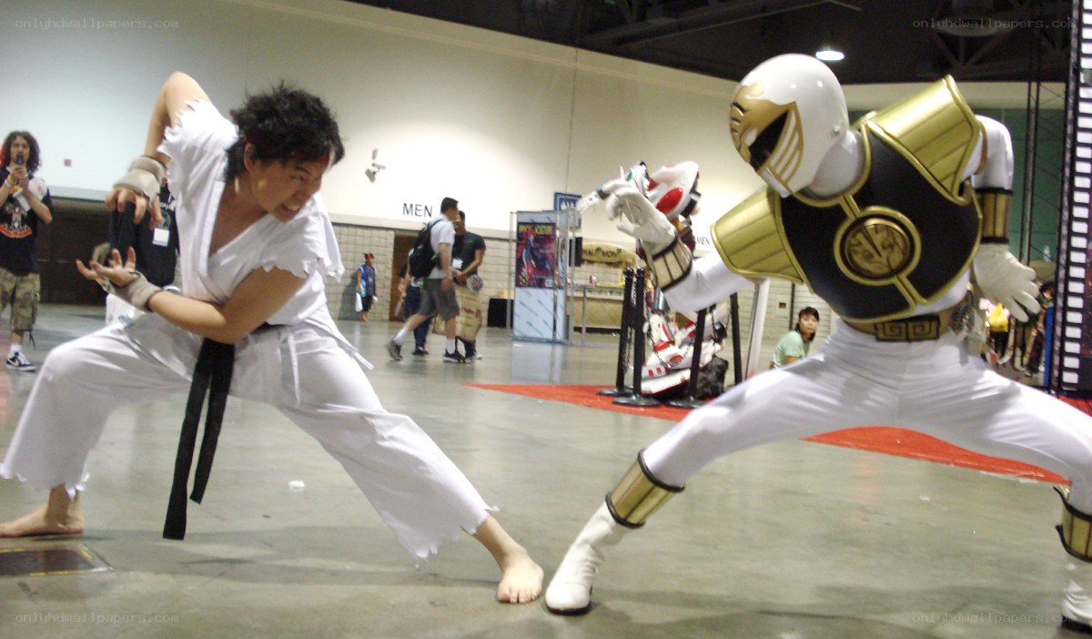 Cosplayers in action at convention