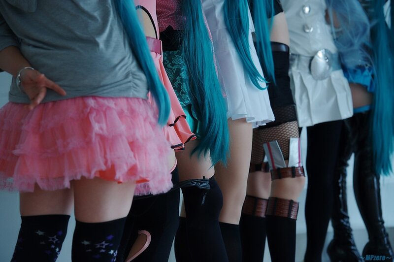 cosplayers in colorful costumes
