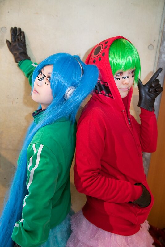 cosplayers in colorful outfits