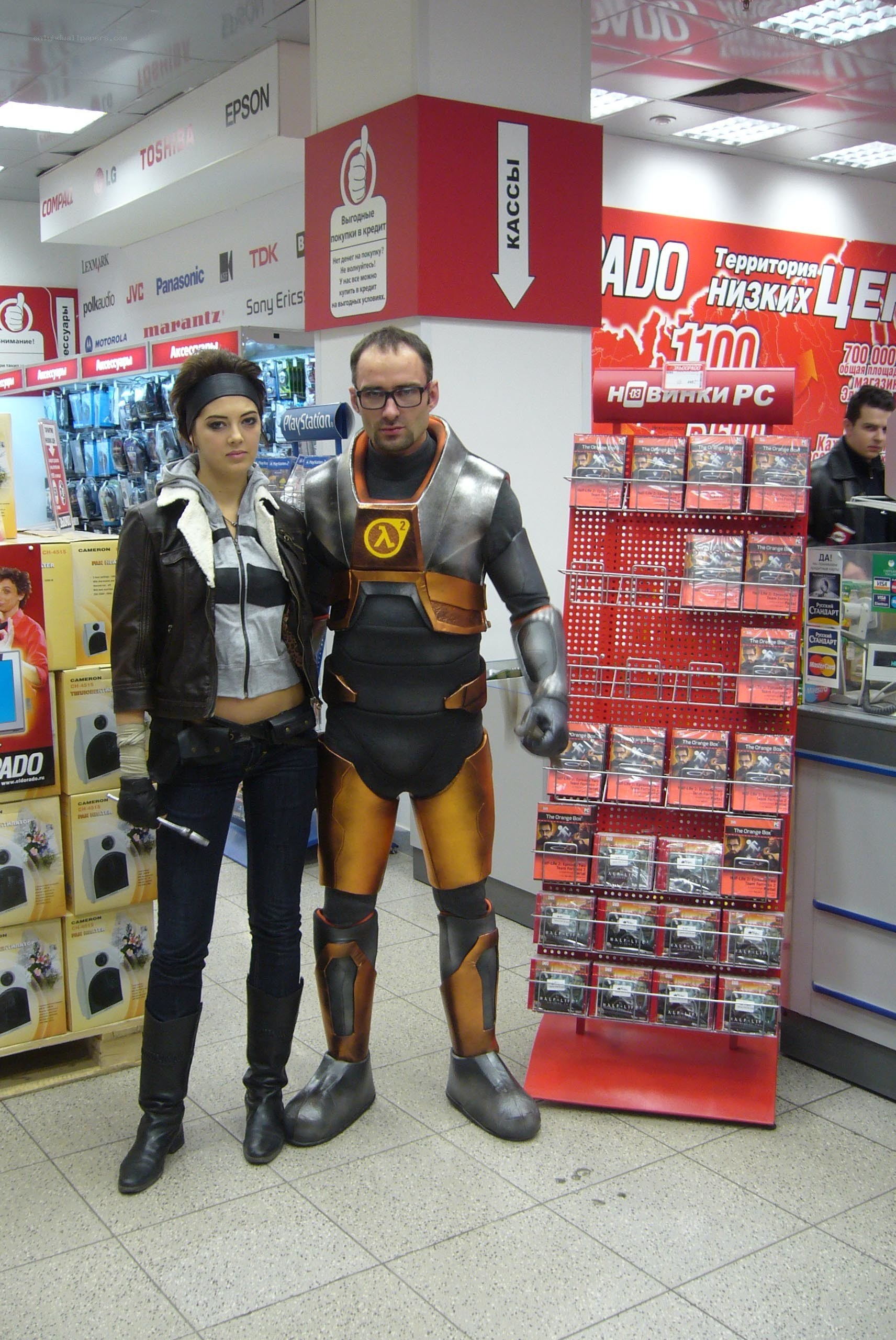 cosplayers in electronics store