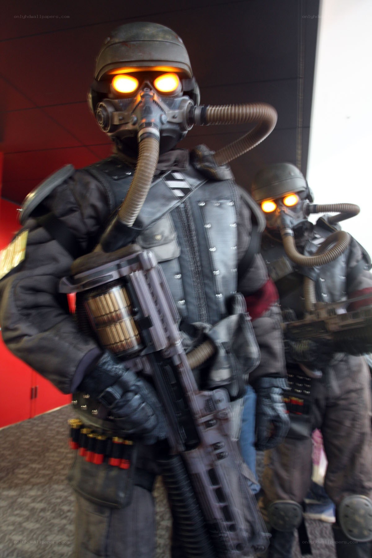 cosplayers in gas mask armor