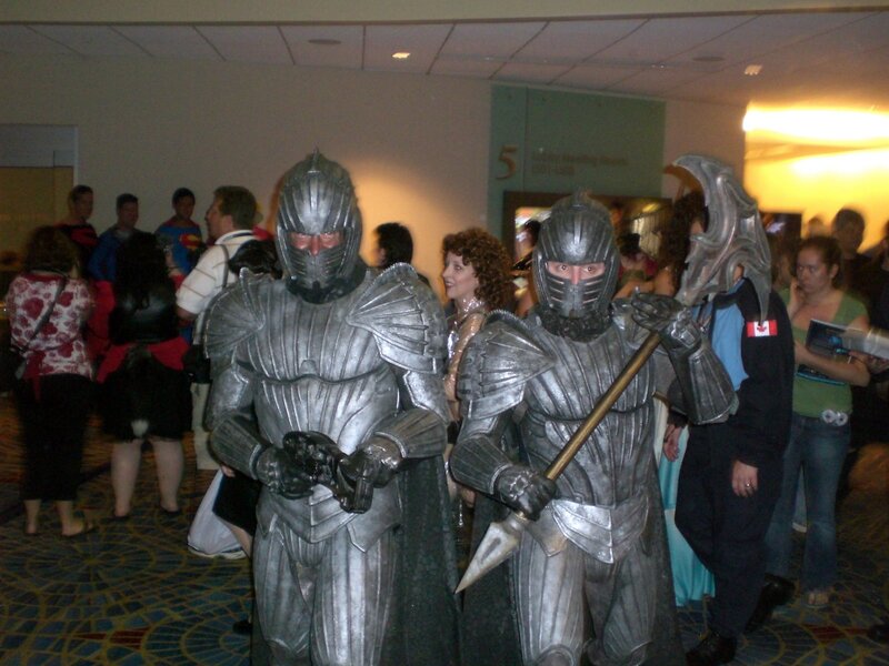 Cosplayers in knight armor at convention