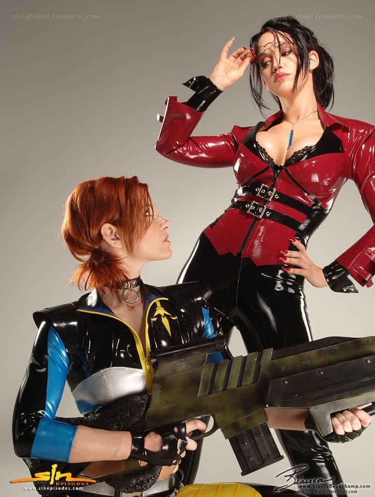 cosplayers in latex costumes