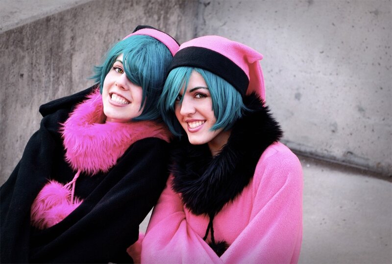 Cosplayers in pink and black