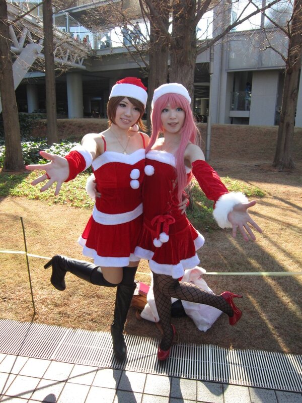 Cosplayers in Santa outfits