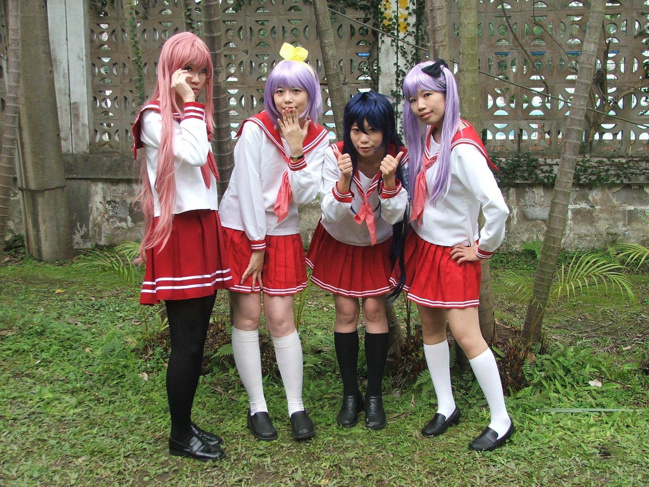 cosplayers in school uniforms