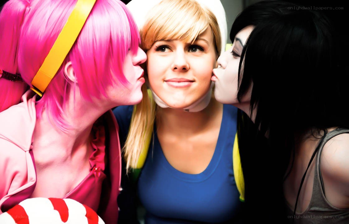 cosplayers kissing on cheeks