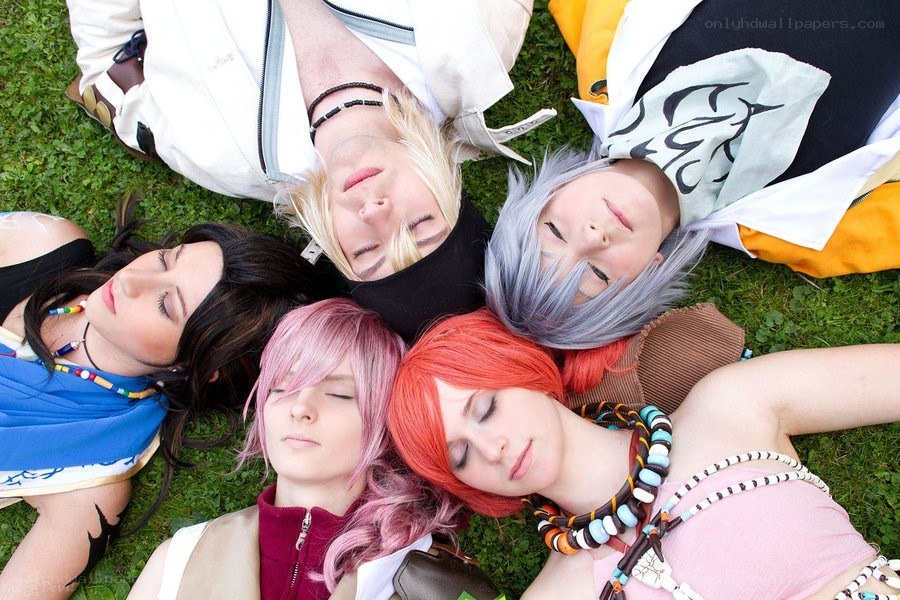 cosplayers lying in a circle