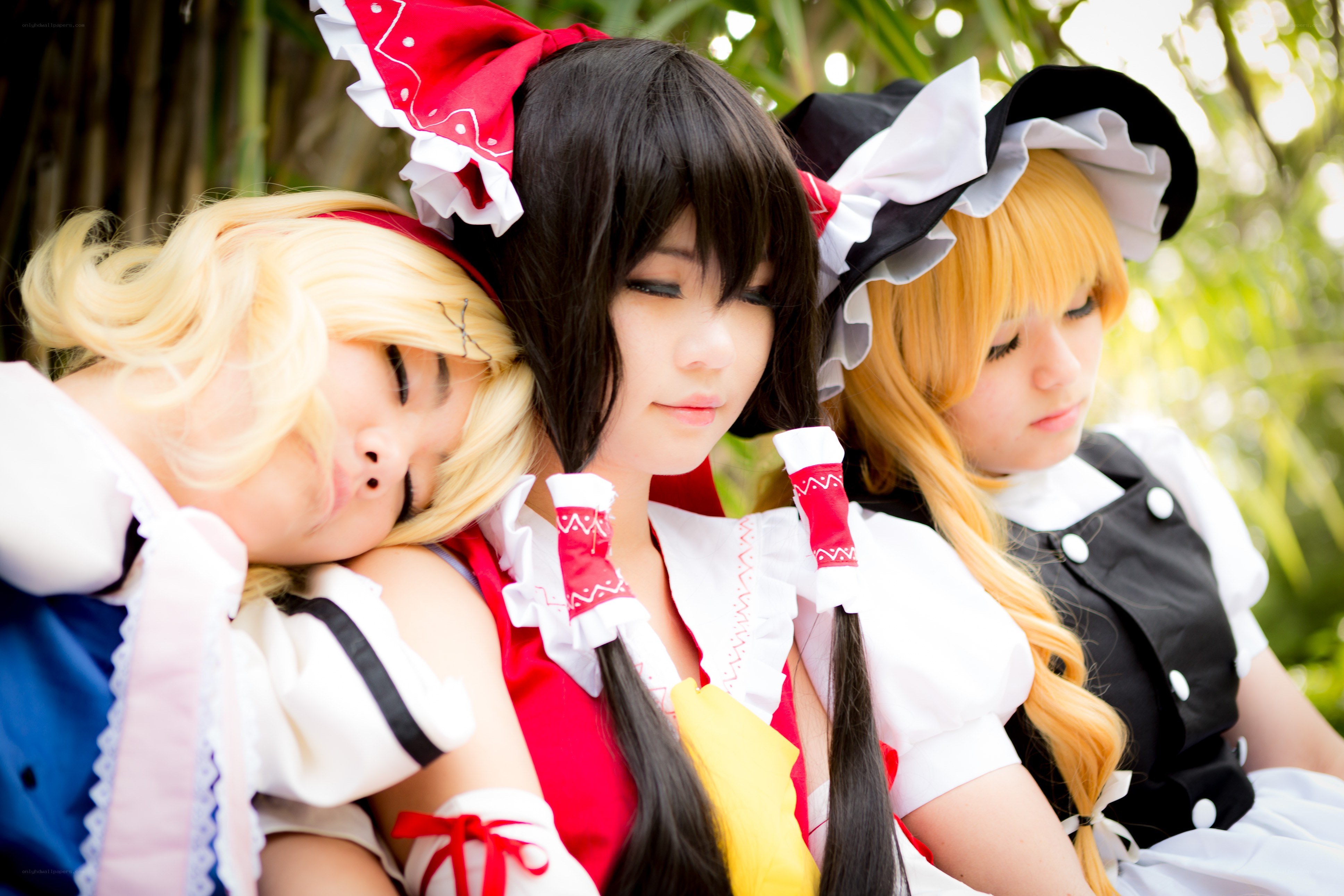 cosplayers resting together
