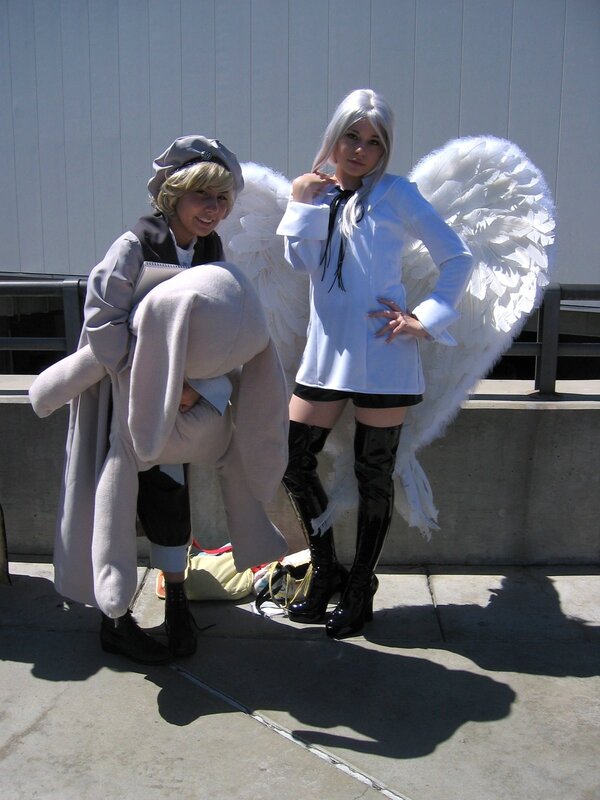 Cosplayers with angel wings