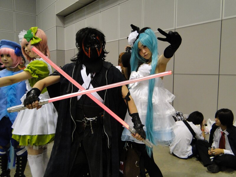 Cosplayers with lightsabers