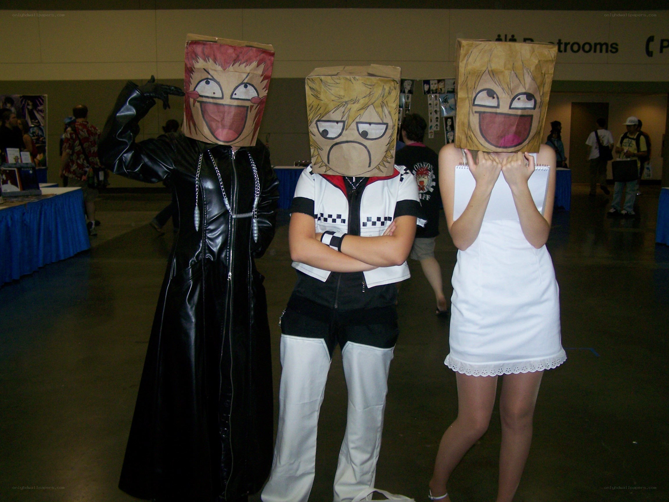 Cosplayers with paper bags