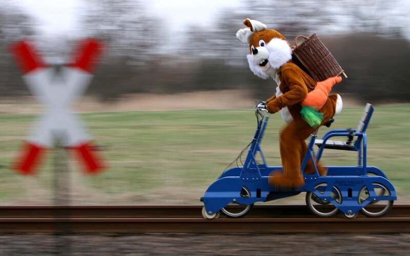 costumed character on rail bike