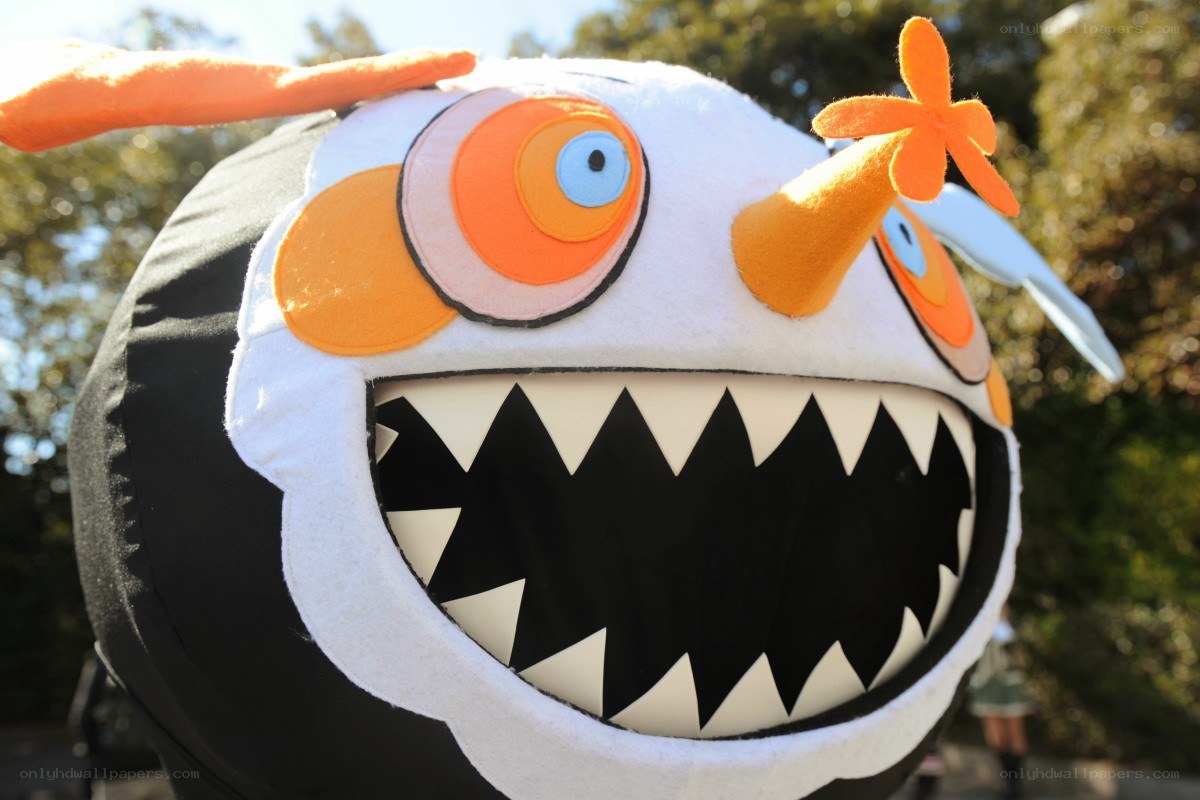 costumed character with large eyes