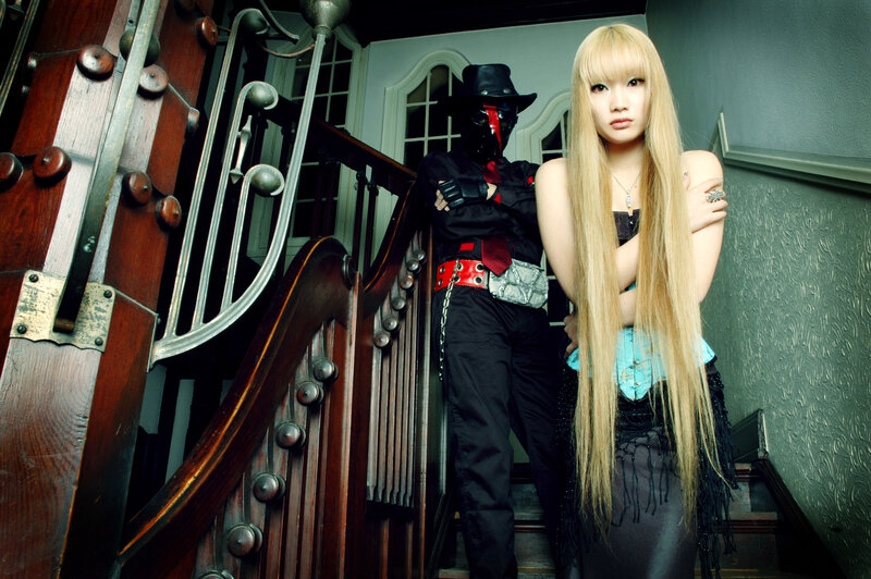 costumed figures on a staircase