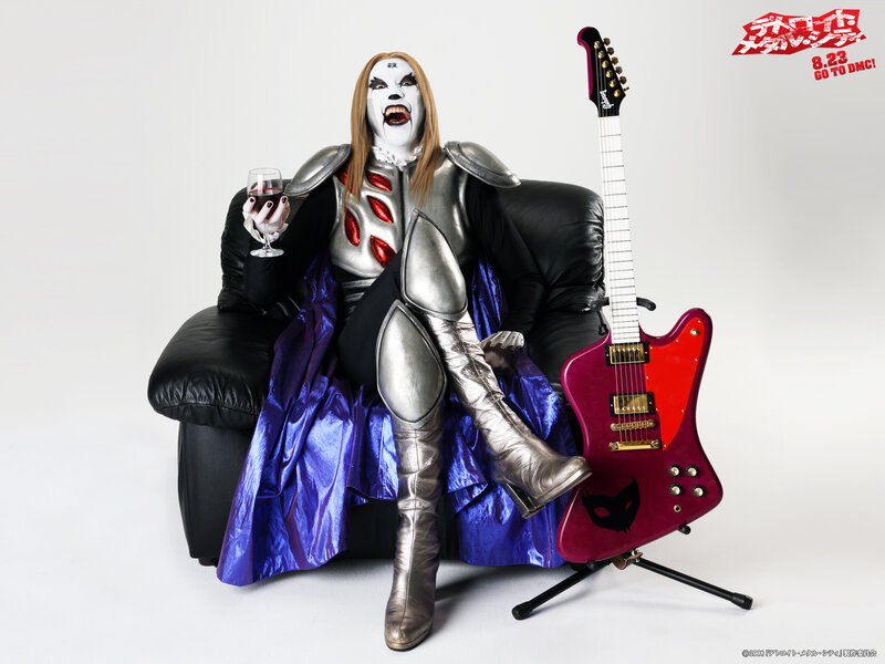 costumed musician with guitar