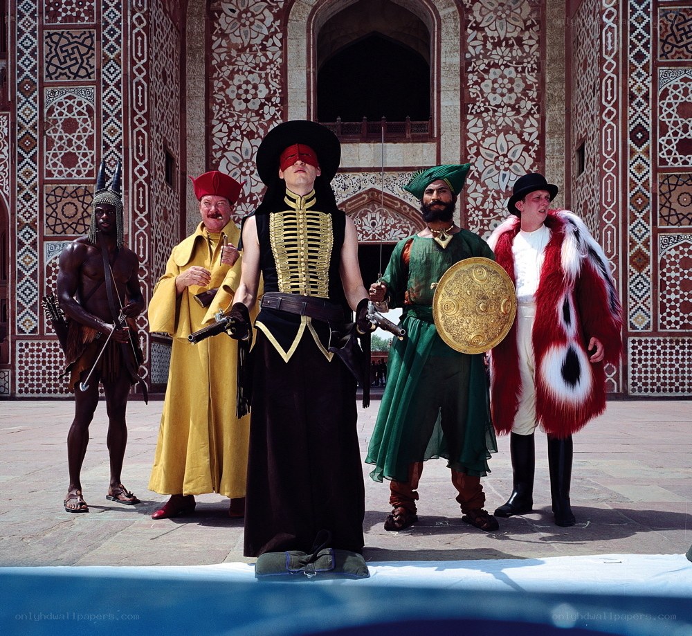 costumed performers in courtyard