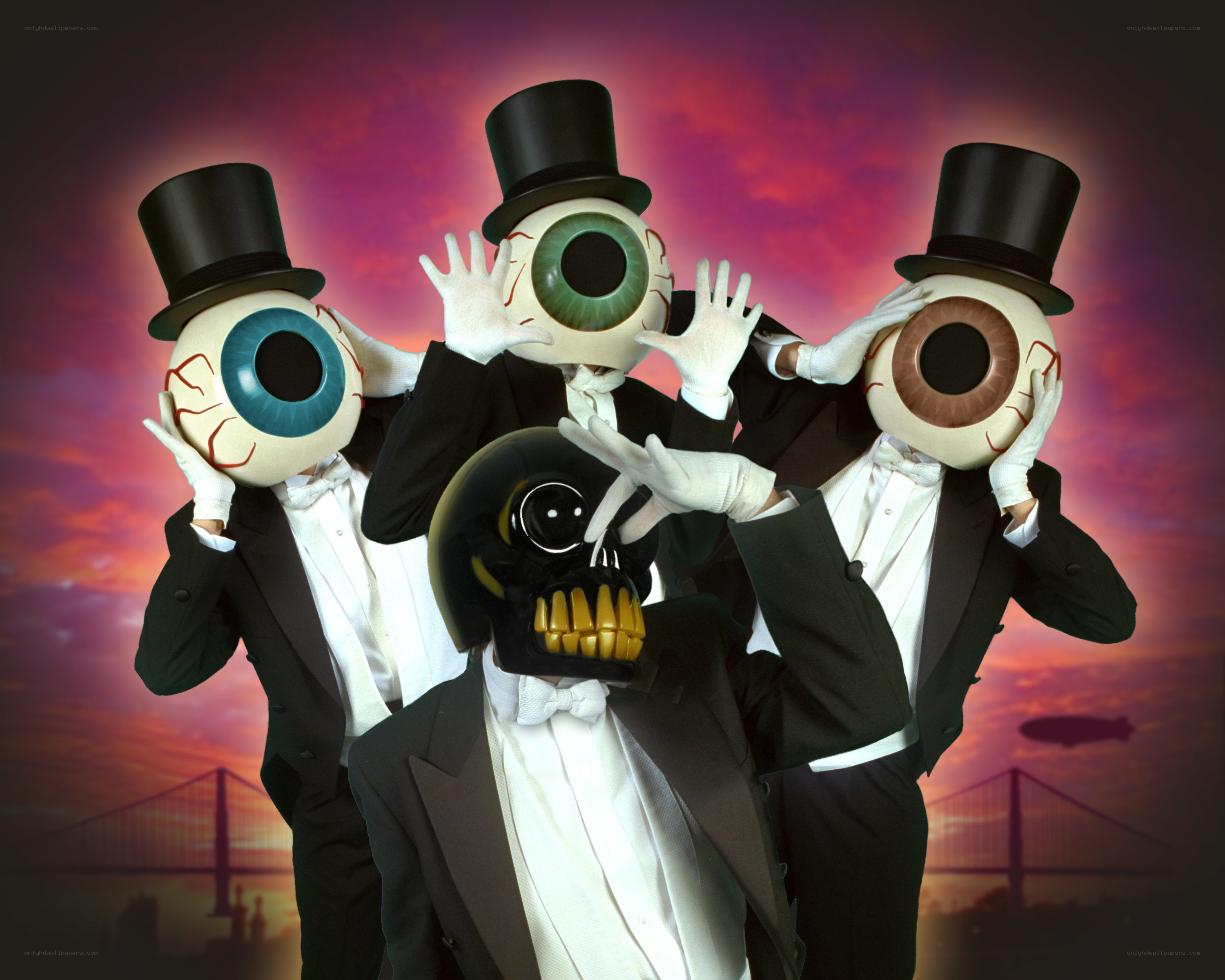 costumed performers with eye masks