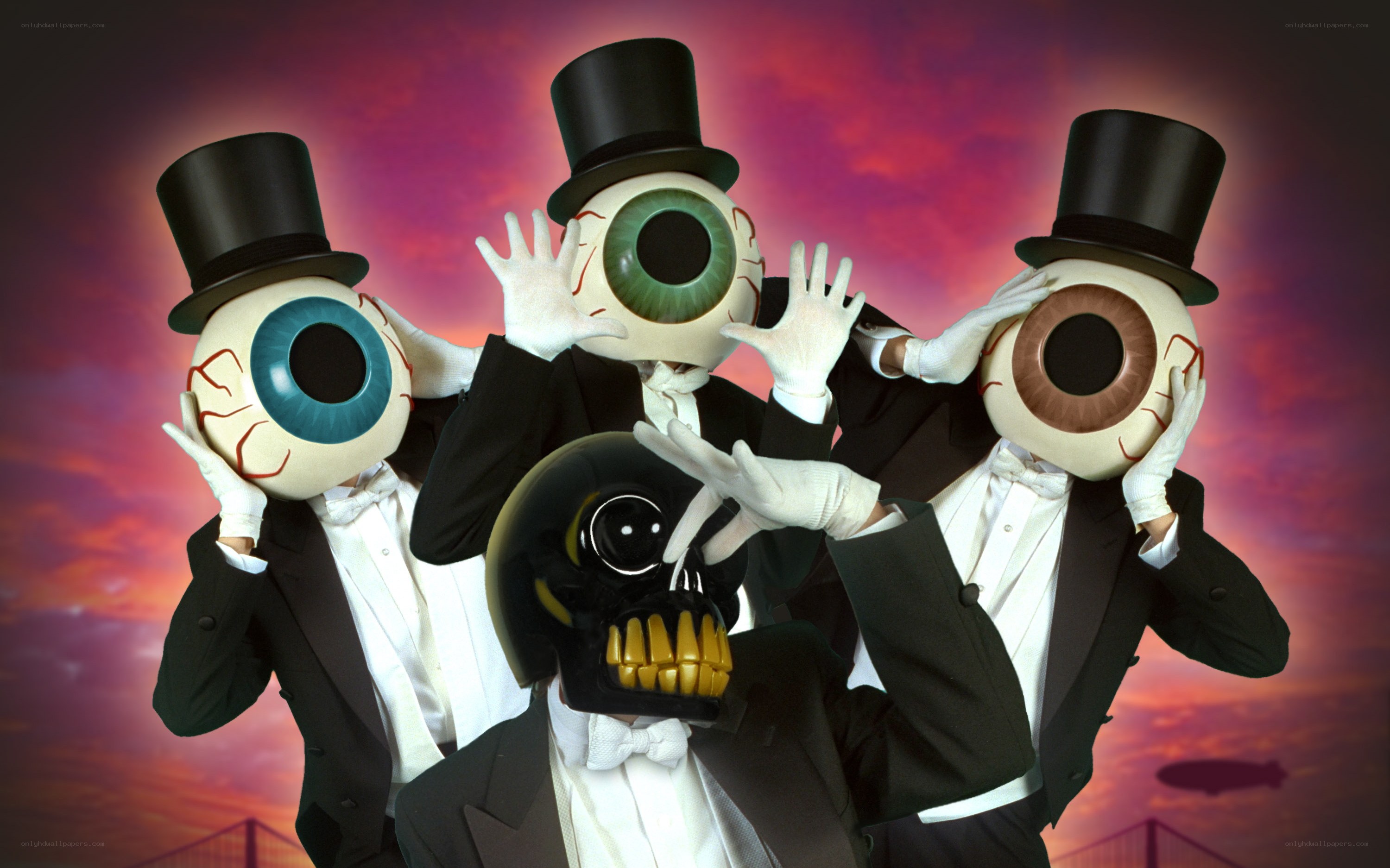 costumed performers with eye masks