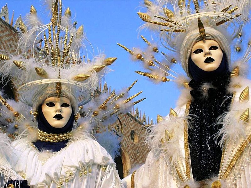 Costumed Revelers in Masks