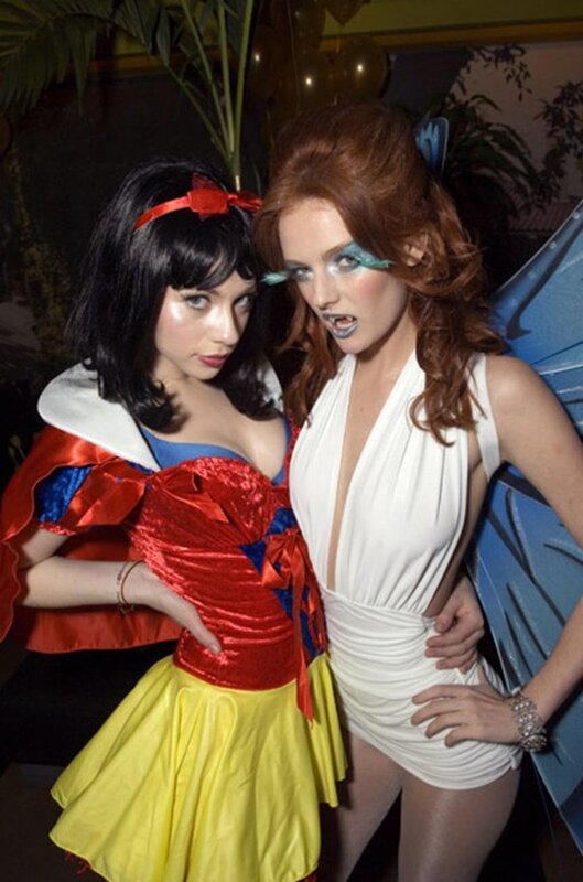 Costumed women at party