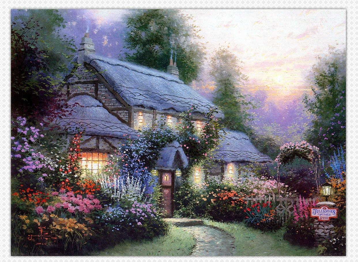 Cottage at dusk with flowers