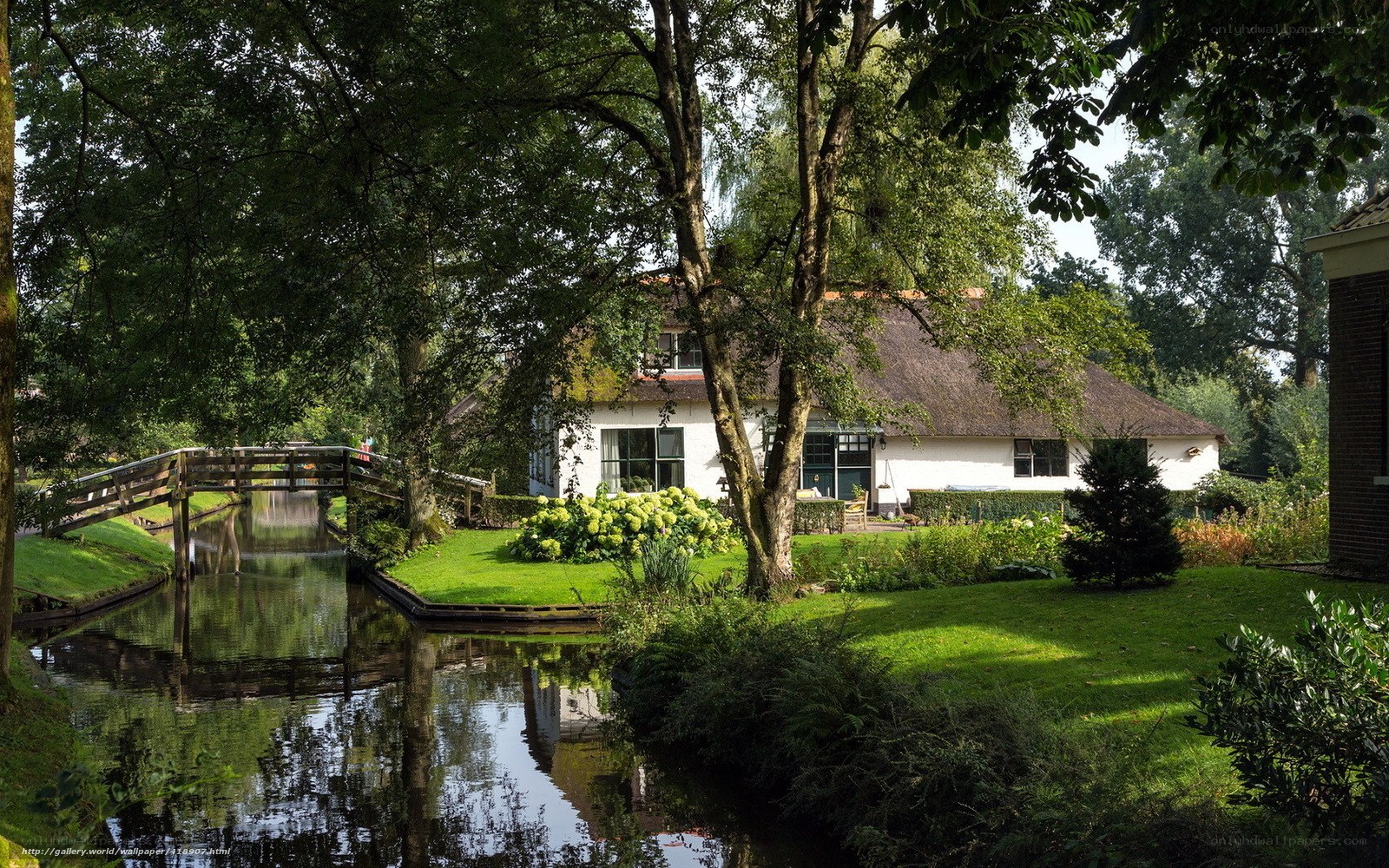 Cottage by a canal in the Netherlands