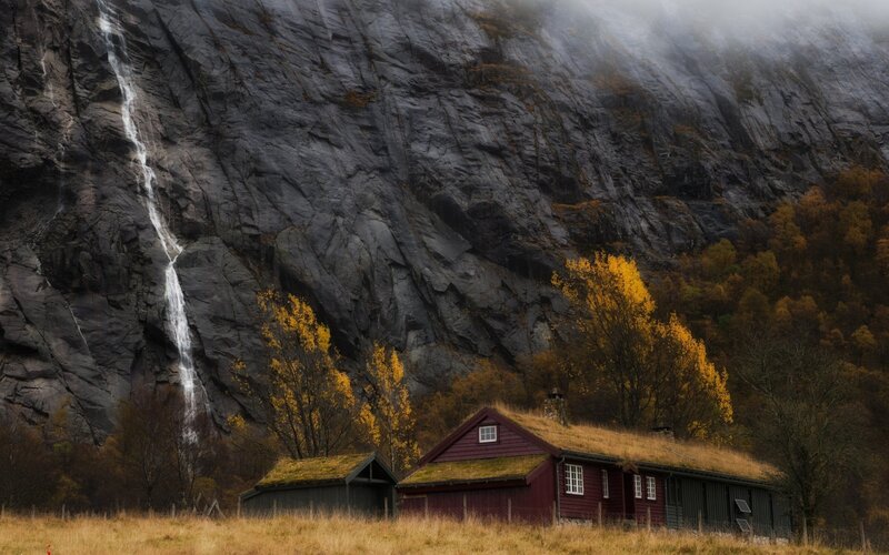 Cottage by a waterfall